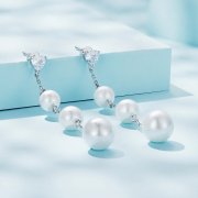 Boucles d'oreilles à pompon et perle de style Pandora - SCE1601